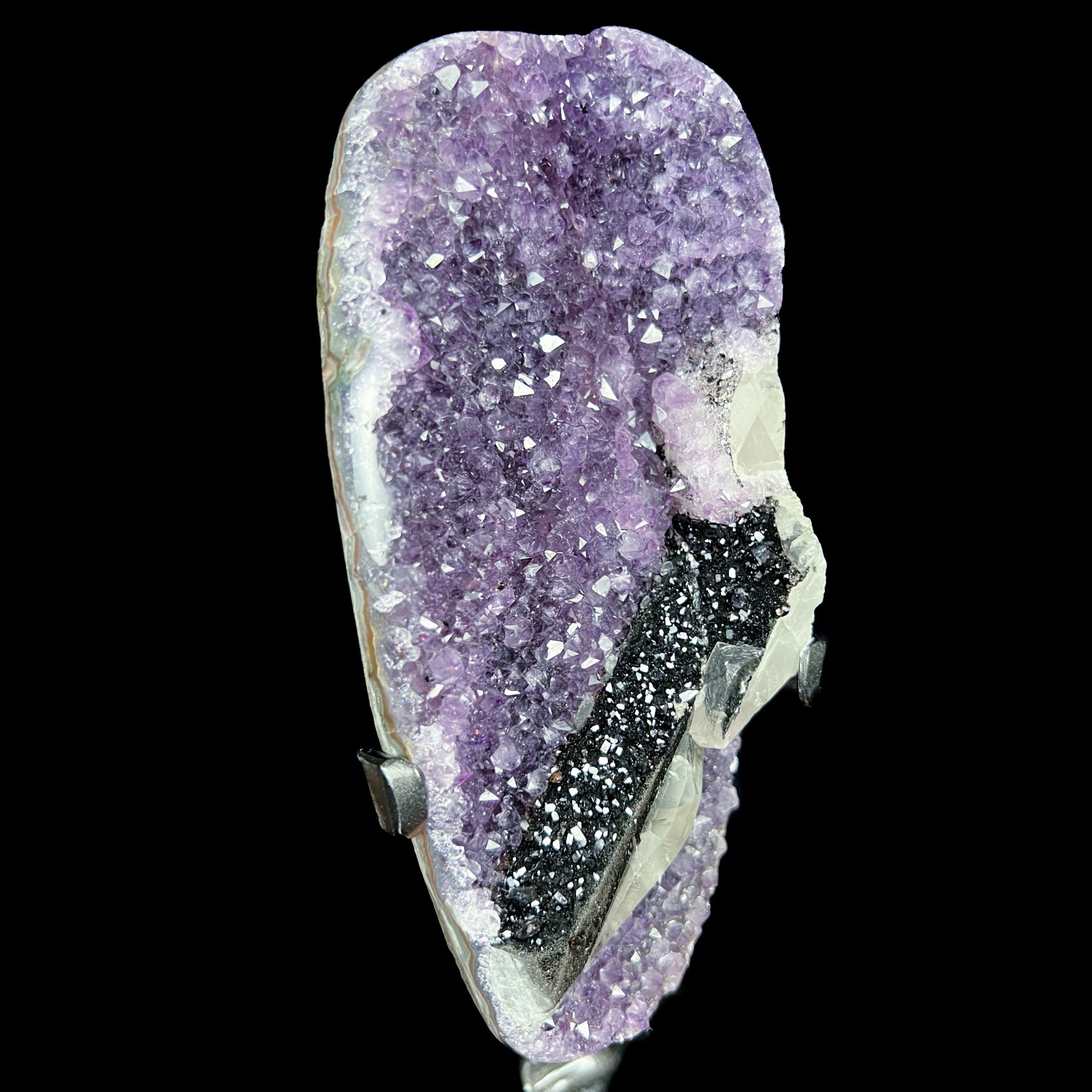 Amethyst Geode with Hematite and Calcite on a Metal Display Stand