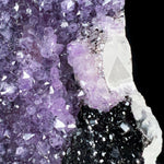 Close Up of Purple Amethyst Crystals on White Calcite Crystals with Black Hematite Crystals