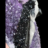 Close Up of  Hematite Crystals on Calcite Crystals atop Amethyst Crystals