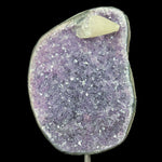 Amethyst Geode with Calcite crystal point on metal display stand