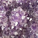 Close Up of Purple Amethyst Crystals inside Geode