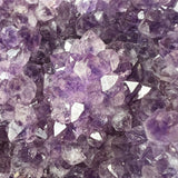 Close Up of Purple Amethyst Crystals inside Geode