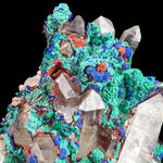 Close Up of Clear Quartz Crystals surrounded by Copper Mineralization and Iron-Oxide