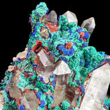 Close Up of Clear Quartz Crystals surrounded by Copper Mineralization and Iron-Oxide