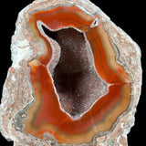 Close up of banded agate and quartz crystals inside a New Mexico geode