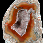 Close up of Quartz crystals and banded agate inside a Baker Ranch Geode