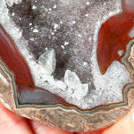 Close up of Calcite crystals, Quartz, and Banded Agate inside a thunderegg