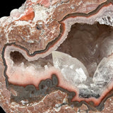 Close up of Calcite crystals and Quartz crystals inside a Baker Egg Geode from New Mexico