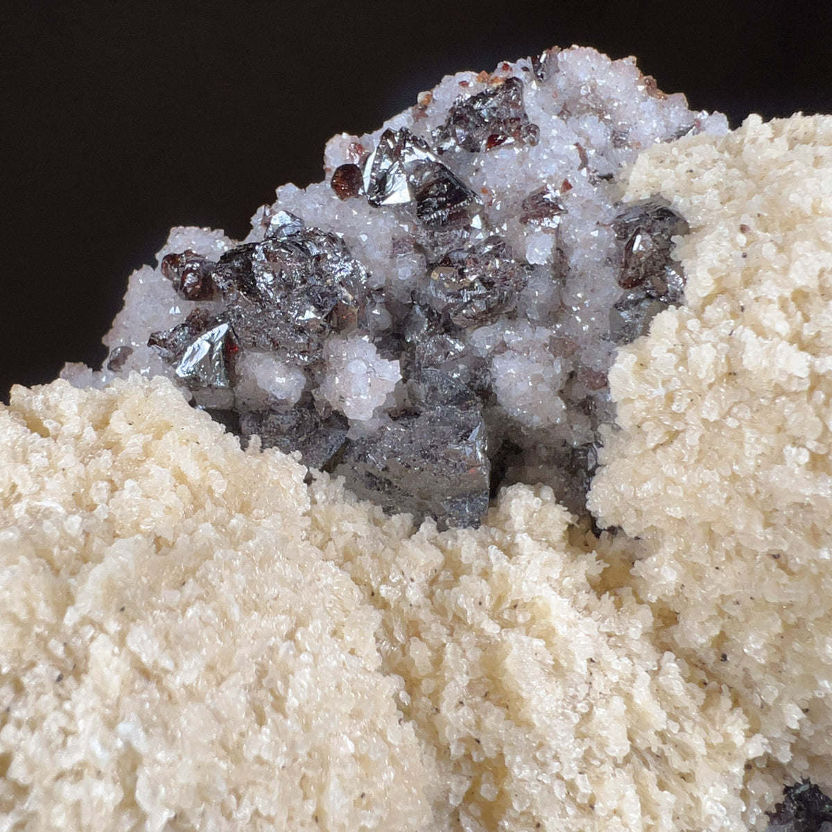 Close Up of Ruby Sphalerite Crystals with White Barite Balls and Drusy Quartz