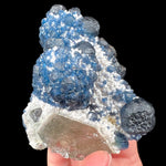 Blue Fluorite Mineral Specimen on White Quartz