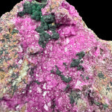 Close-up of pink Cobalto Calcite crystals with green Malachite crystals