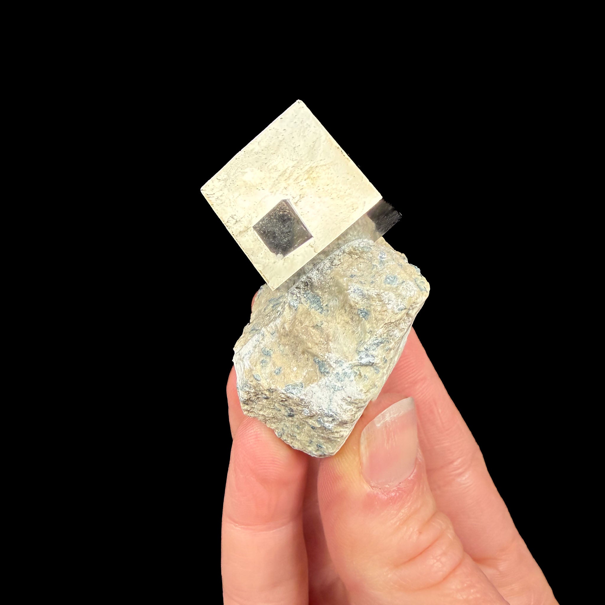 Mini Pyrite cube on larger Pyrite cube from Spain