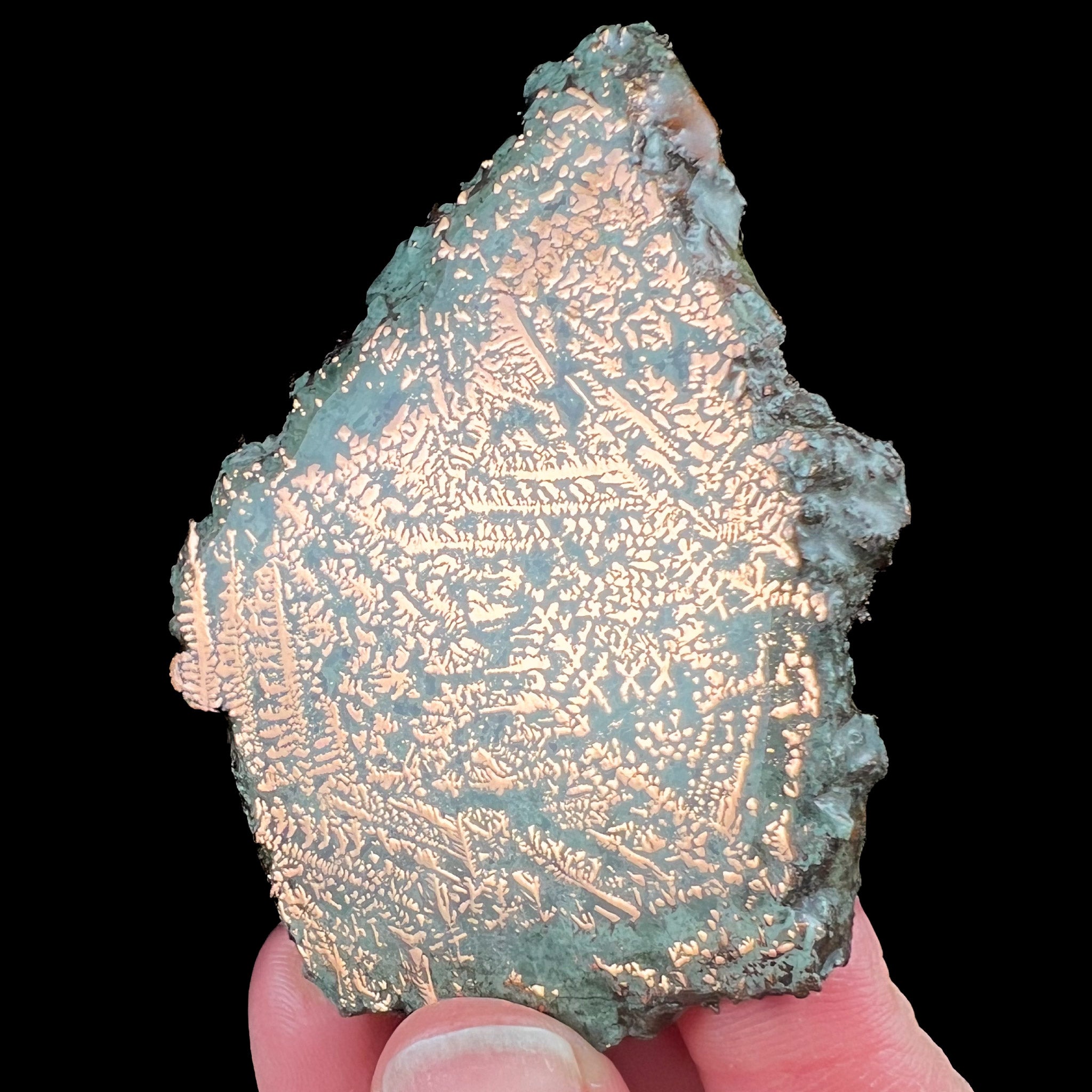 Native Copper Twinning on stone slice from the Phoenix Mine, Michigan