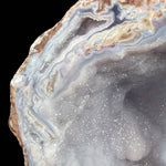 Close up of Quartz, Agate and Chalcedony crystal bands inside a Dugway Geode