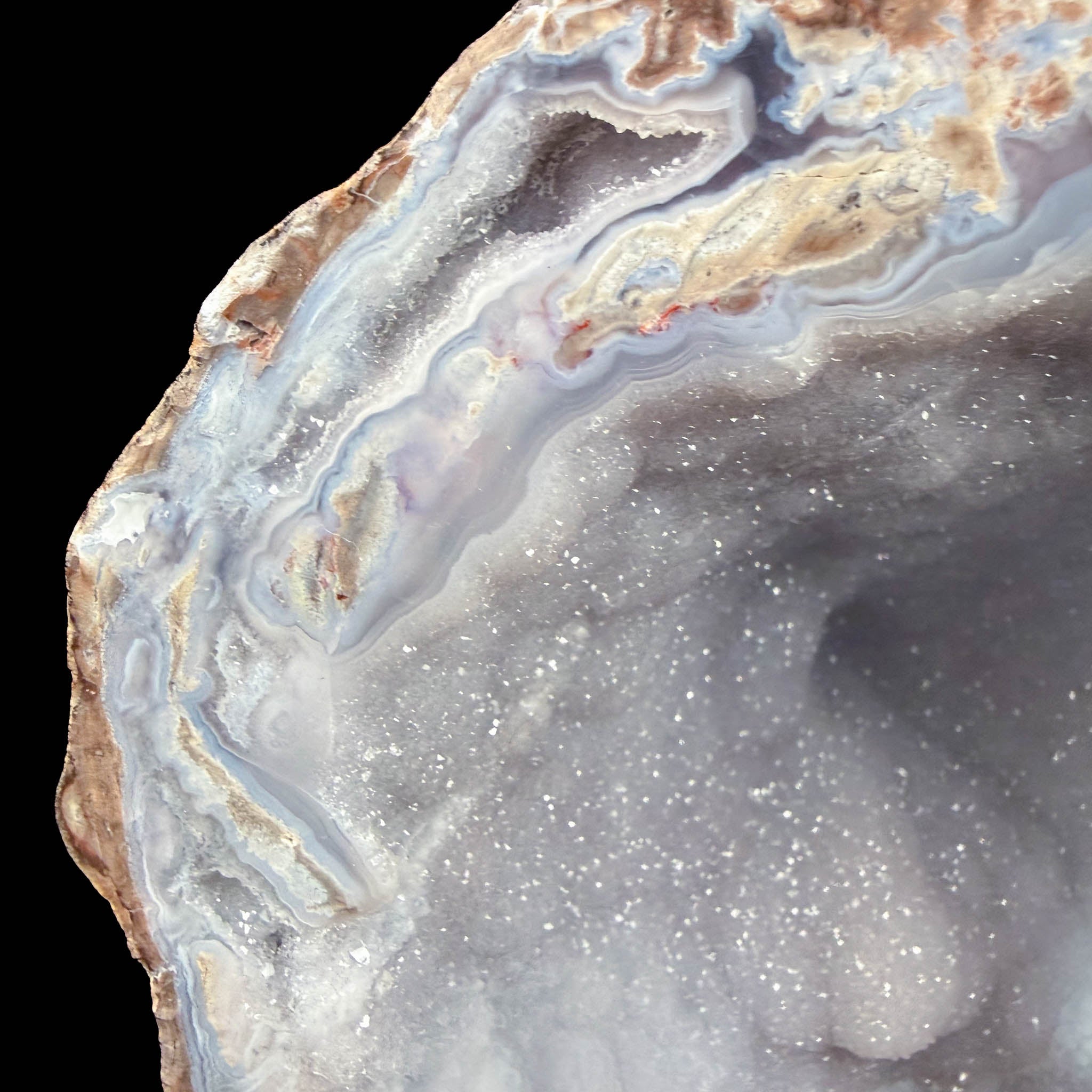 Close up of Quartz, Agate and Chalcedony crystal bands inside a Dugway Geode