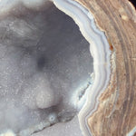 Close up of agate banding and quartz crystals inside a Geode from Dugway, Utah