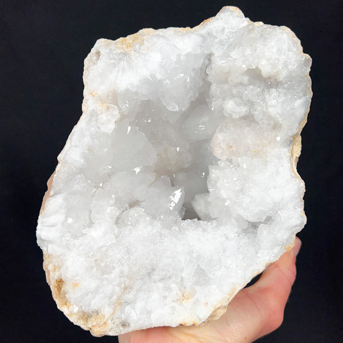 Interior of a Quartz Geode with White Crystals