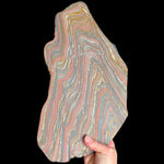Unpolished side of Tiger Iron Slice