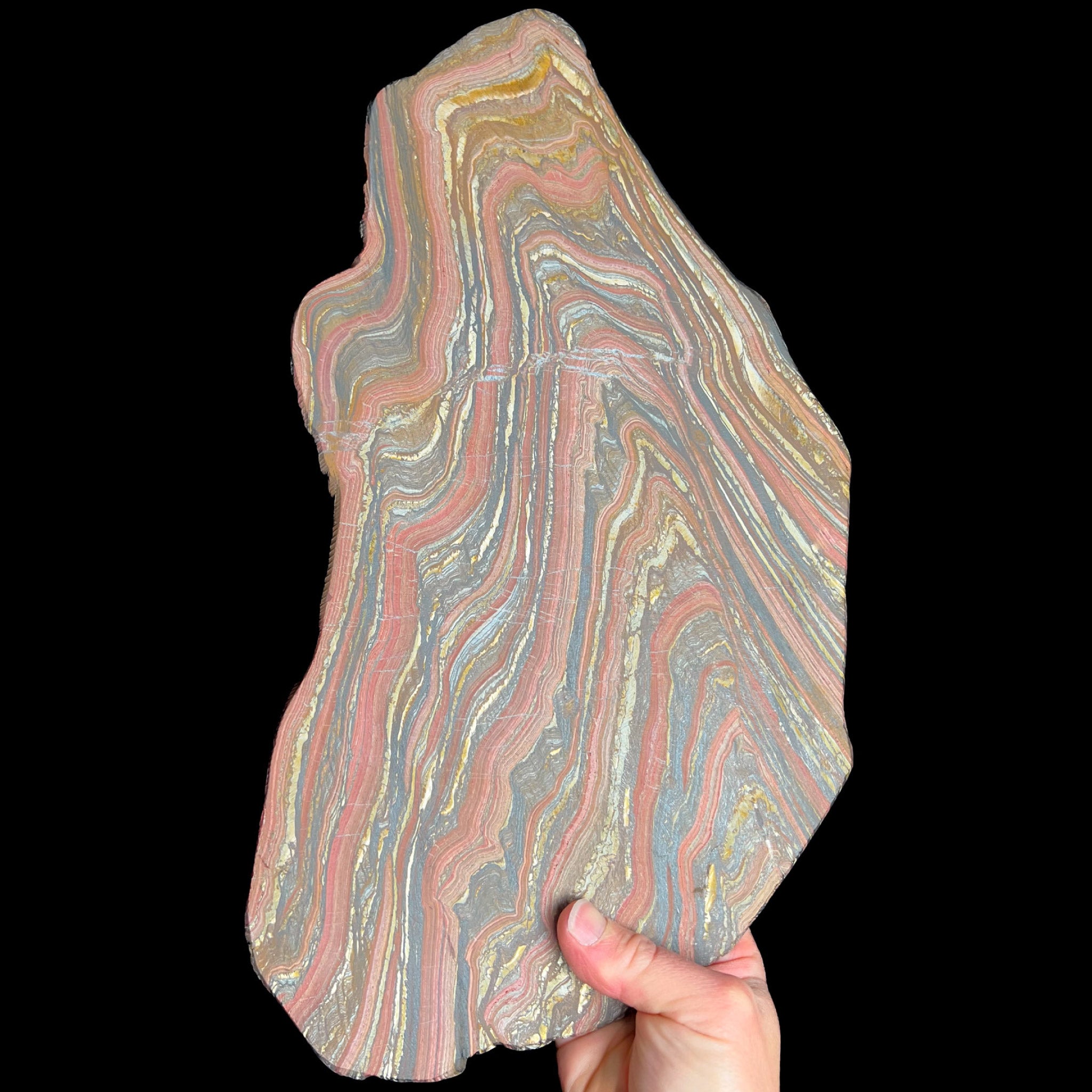 Unpolished side of Tiger Iron Slice