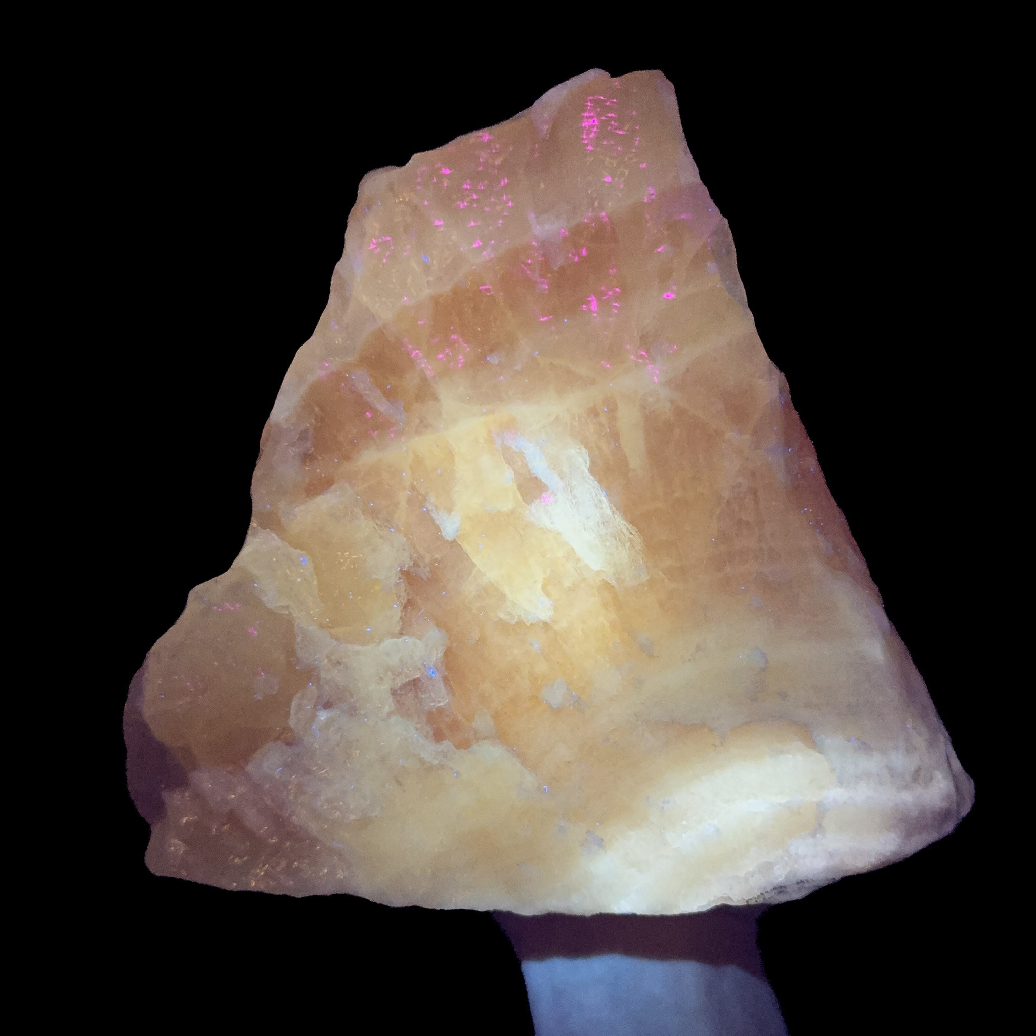 Massive style Calcite displaying fluorescence under UV light
