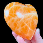Side View of Orange Stone Calcite Heart