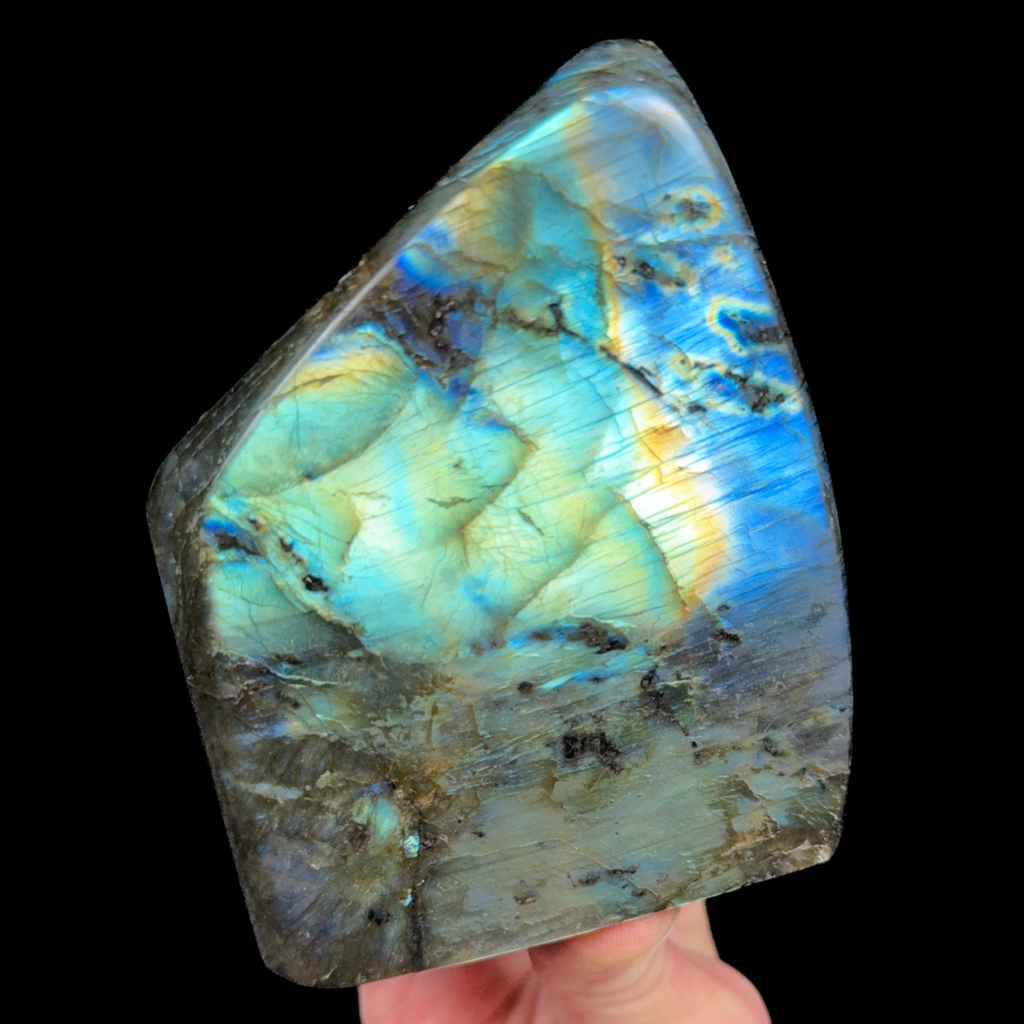 Teal, gold and blue colored Labradorite stone from Madagascar