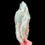 Side view of Green Aragonite Stone Slice from Spain