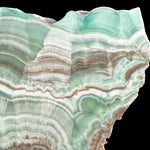 Close up of Teal Green Copper Replaced Aragonite Stone Slice