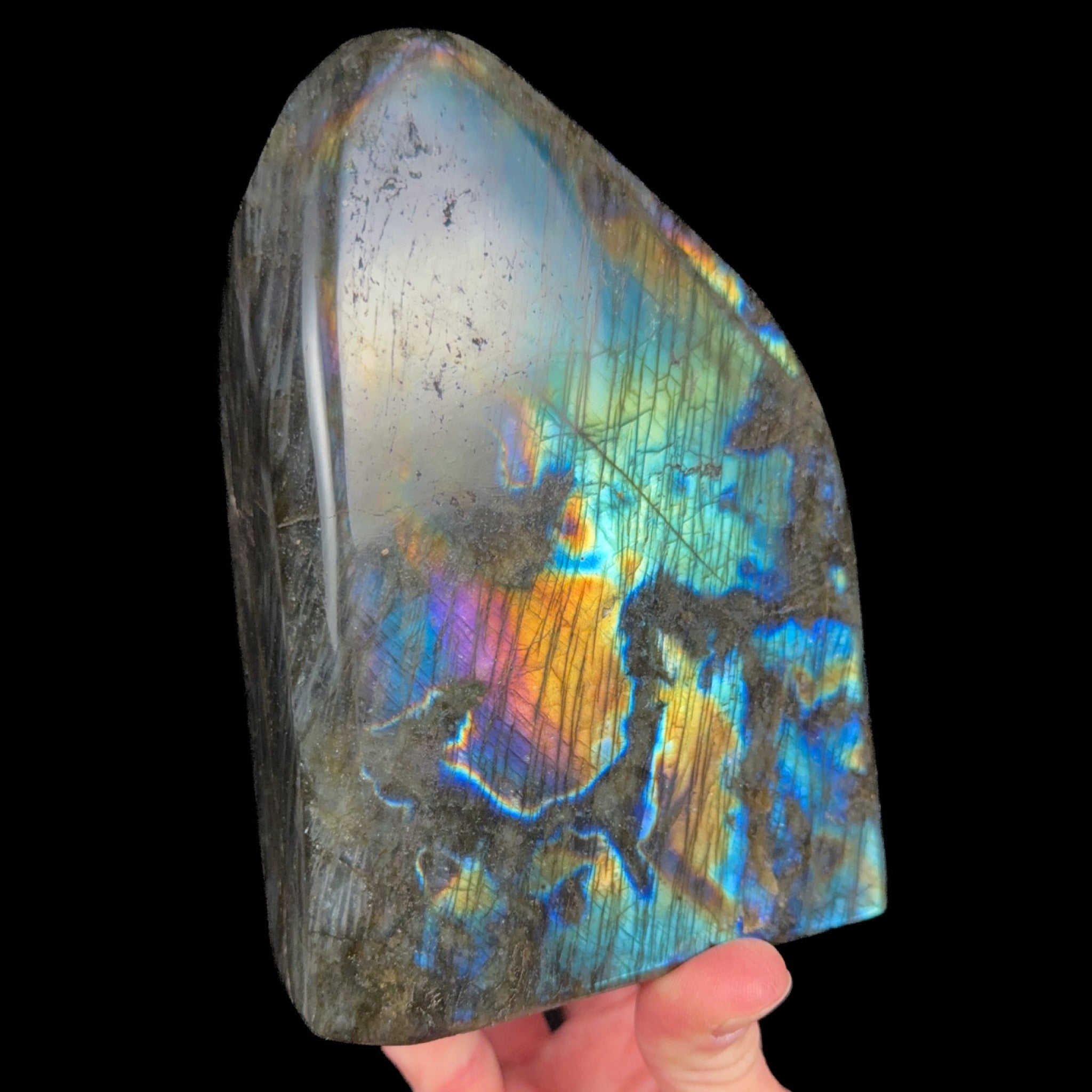 Large fully polished Labradorite stone with a rainbow of colors