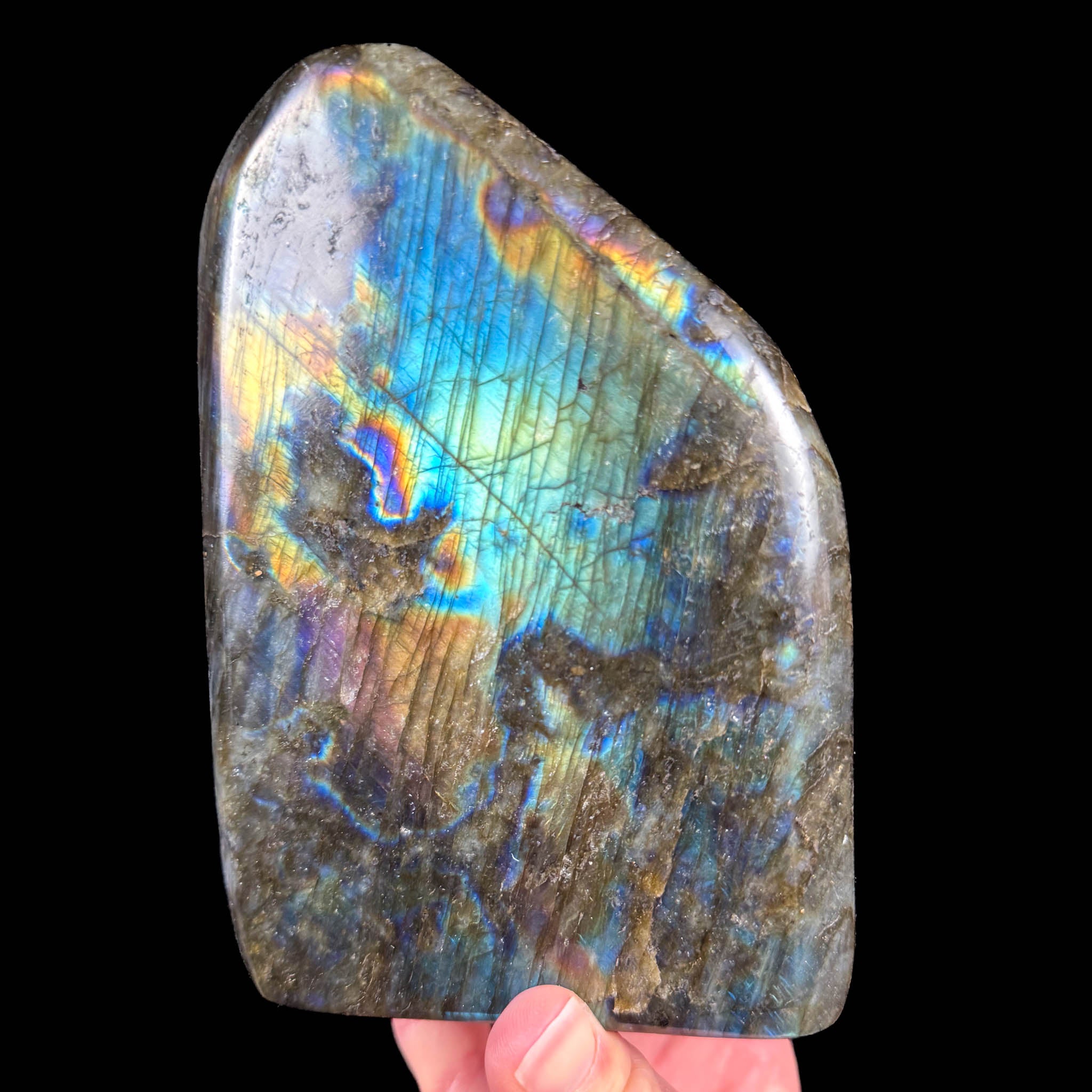 Large fully polished Labradorite stone with a rainbow of colors
