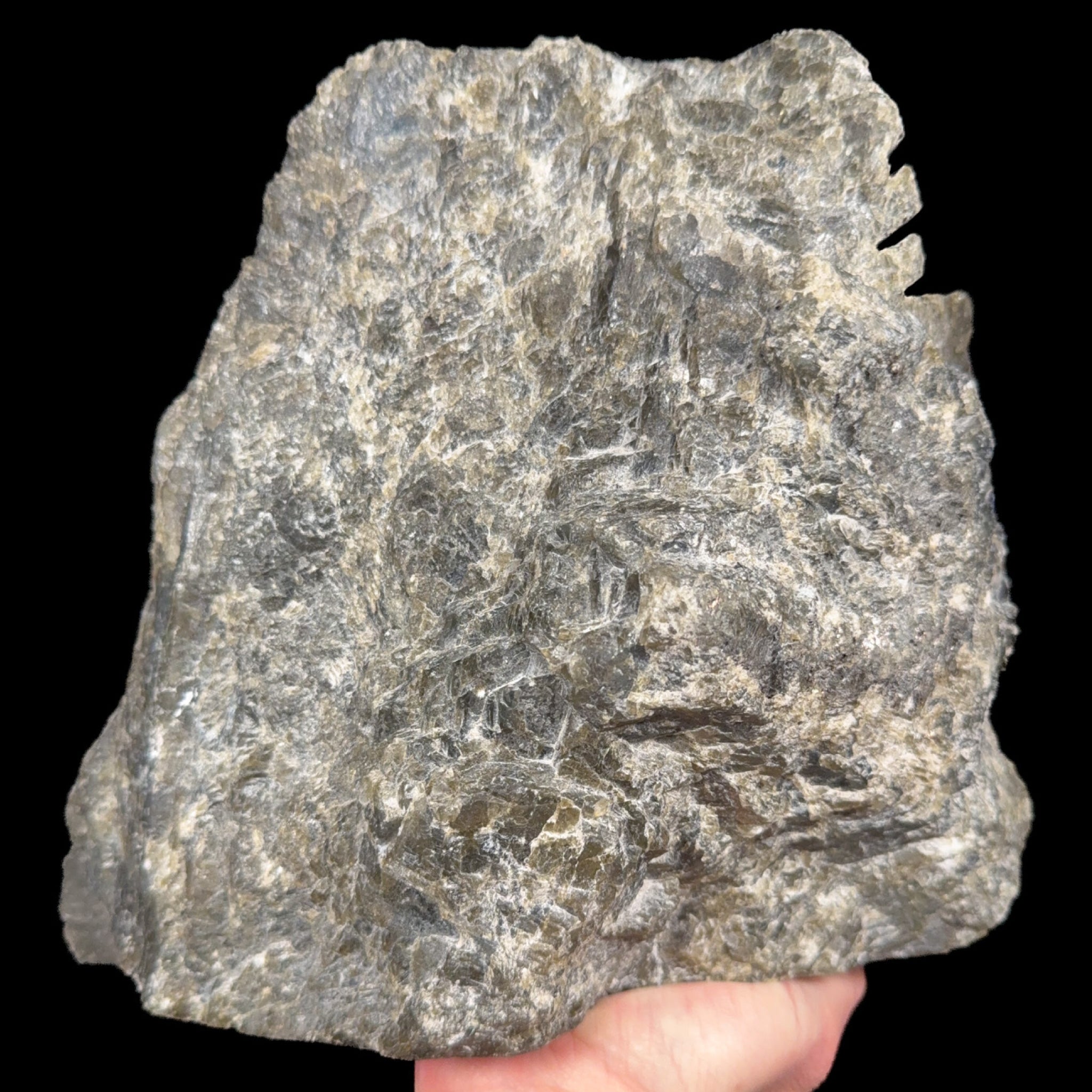 Raw exterior / back side of Labradorite