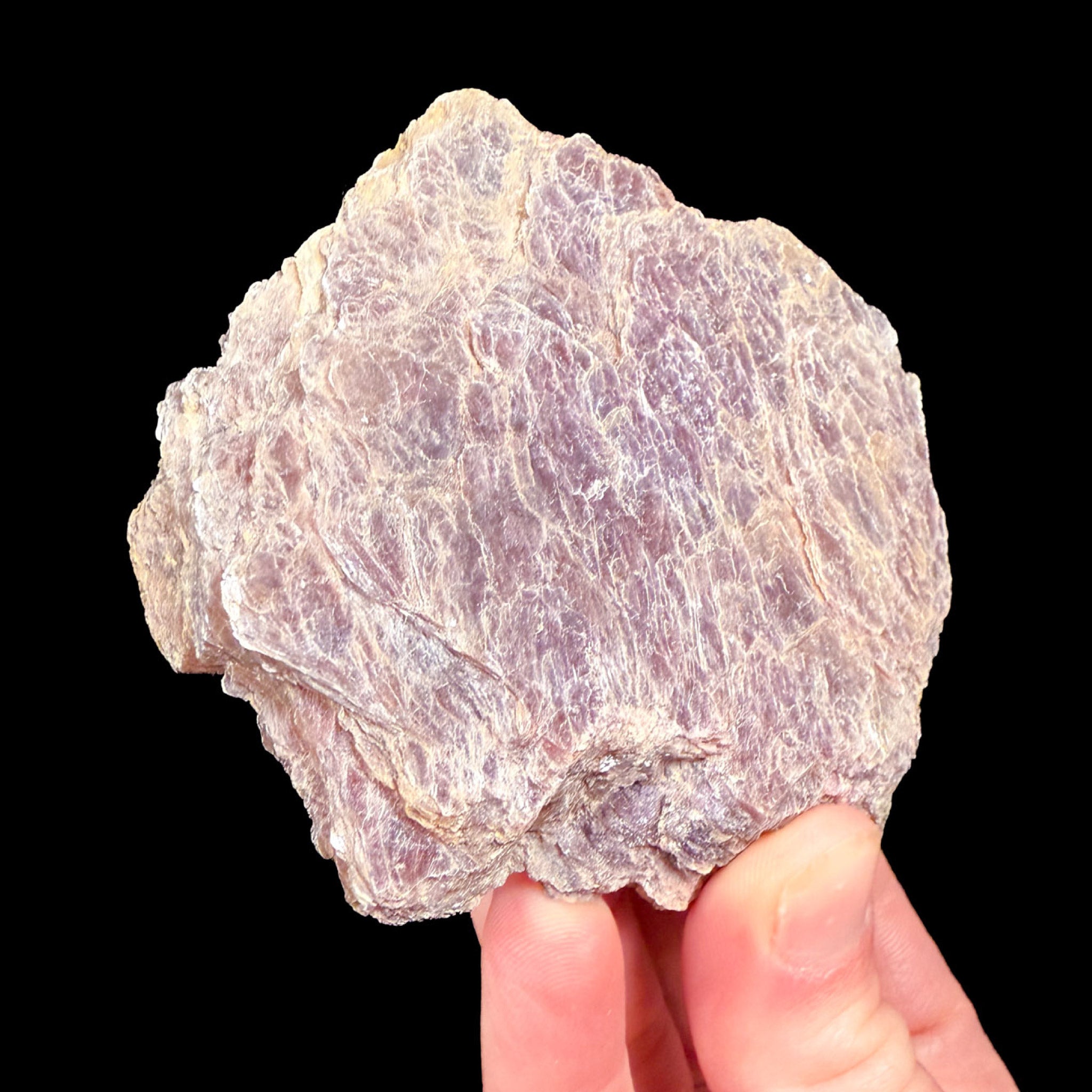 Side view of Lepidolite mica book