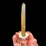 A natural raw golden yellow Citrine crystal point which has not been treated or heated to alter the color. 