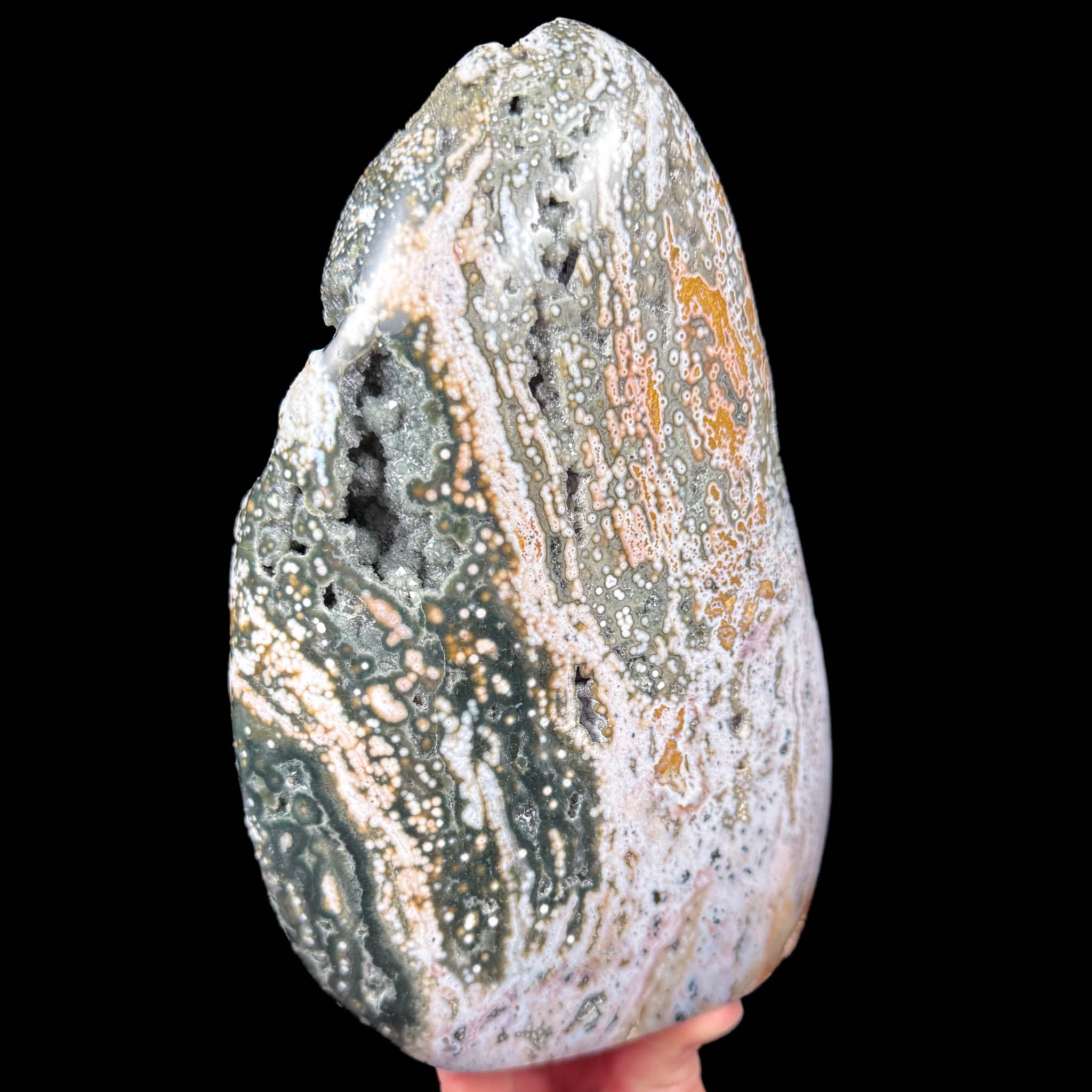 Side view of large ocean jasper stone