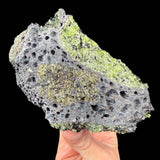 Olivine in basalt raw rock specimen from Arizona