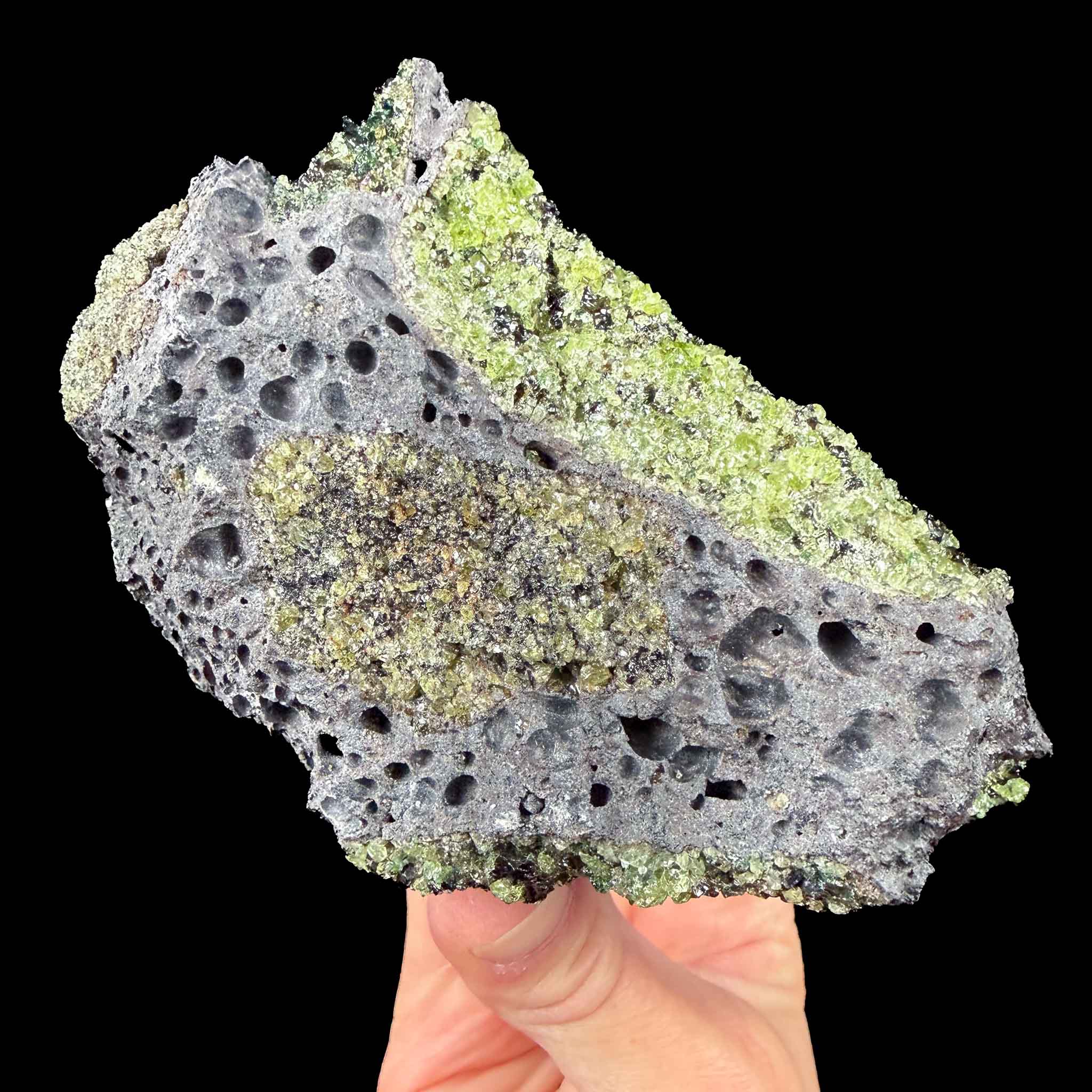 Olivine in basalt raw rock specimen from Arizona