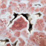 Close up of Quartz crystals inside a Pink Cotton Candy or Bubblegum Agate stone from Mexico