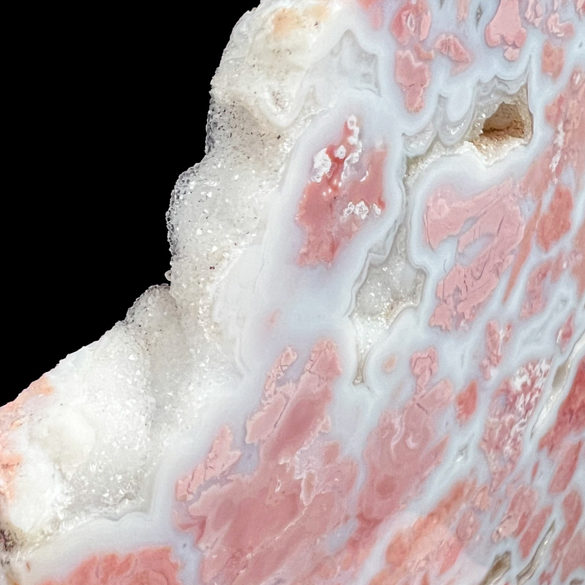 Close up of white Drusy Quartz crystals and Pink Agate from Mexico
