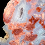 Close up of Quartz crystal pockets in pink Agate from Mexico