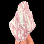 Pink Tourmaline crystals in a white Albite rock matrix