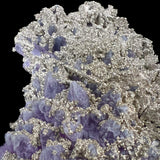 Natural mineralization of Pyrite on top of Amethyst crystals
