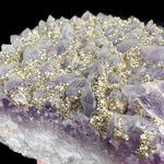 Pyrite Crystals growing with Amethyst crystals