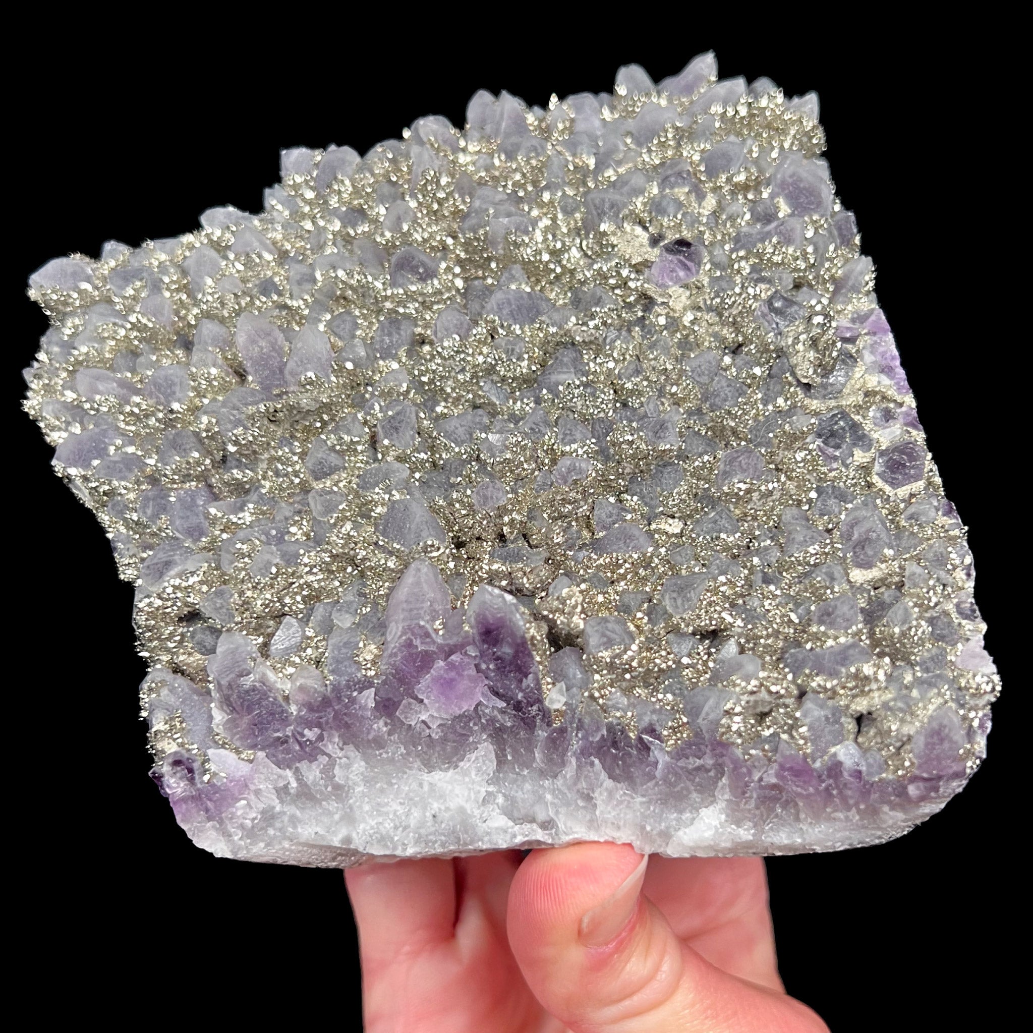 Pyrite coating on Amethyst
