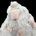 Close up of Quartz crystal coating pink Rhodochrosite crystals from Sunnyside Mine, Colorado
