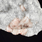 Close up of Rhodochrosite crystals coated by white Quartz crystals from Colorado