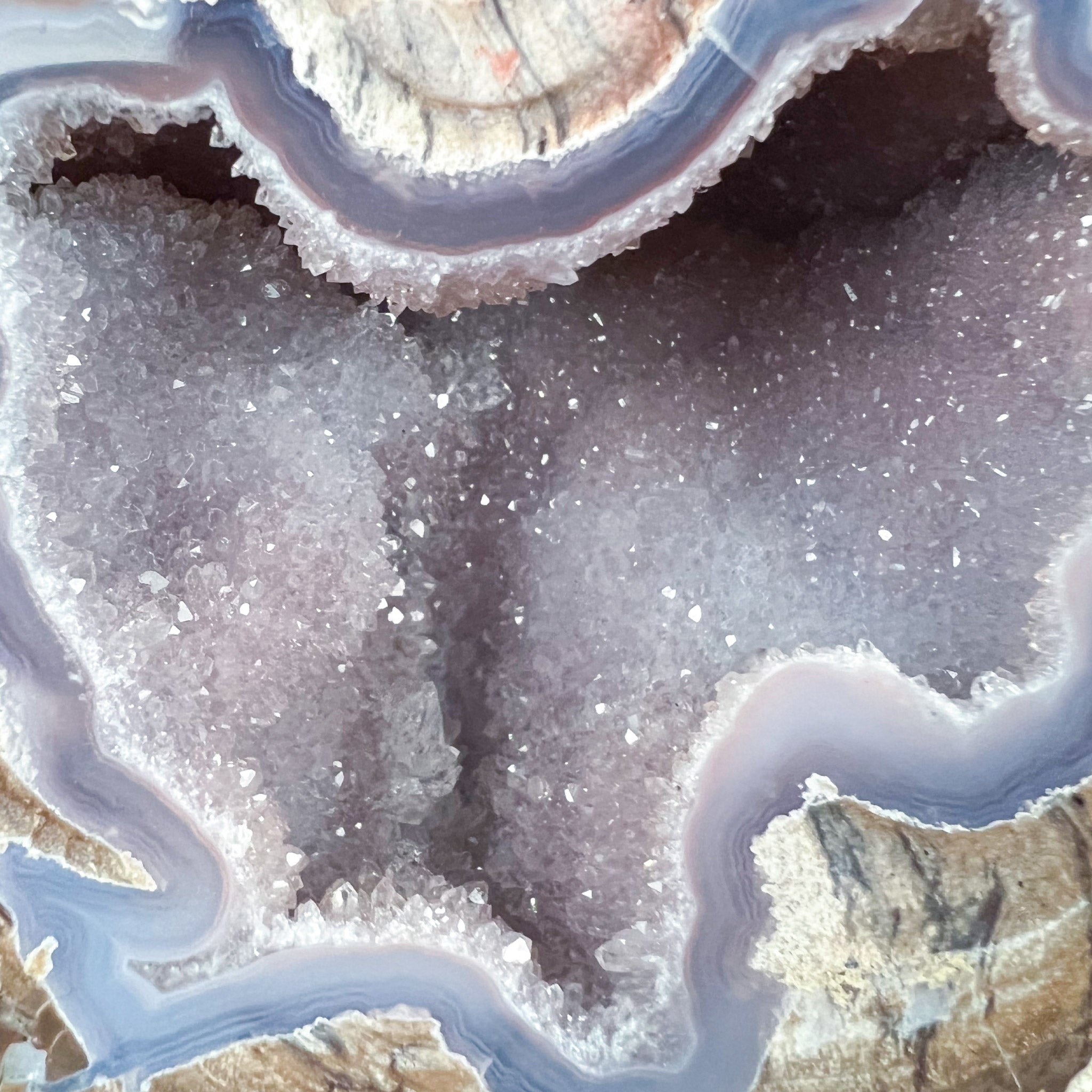 Close Up of Drusy Quartz Crystals and Chalcedony and Agate Banding