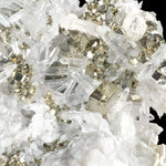 Close up of Pyrite cube with Quartz crystals