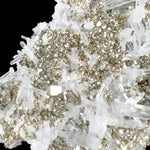 Close up of Pyrite cubes in clear Quartz crystal points