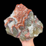 Raw Calcite and Aragonite stone specimen from Mexico with red, white, and green color banding