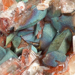 Close-up of iridescent Chalcopyrite on Calcite crystals